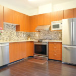 Kitchen With Stainless Steel Appliances and Granite Countertops